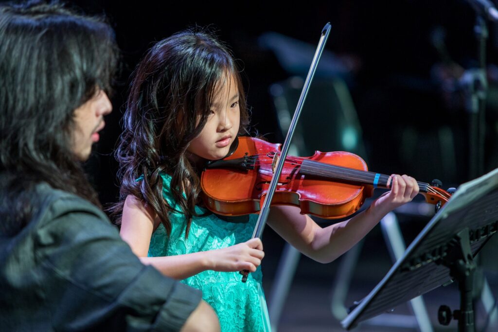 Young Violin Student Performing